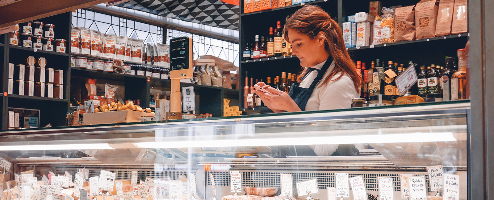 Woman at bakery counter