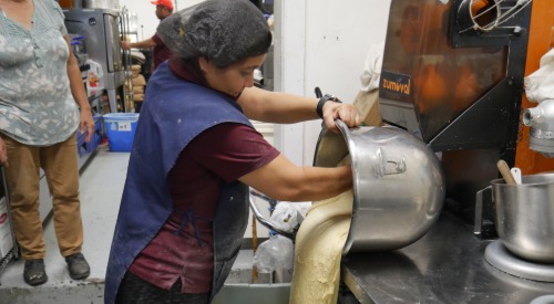 woman pouring batter 