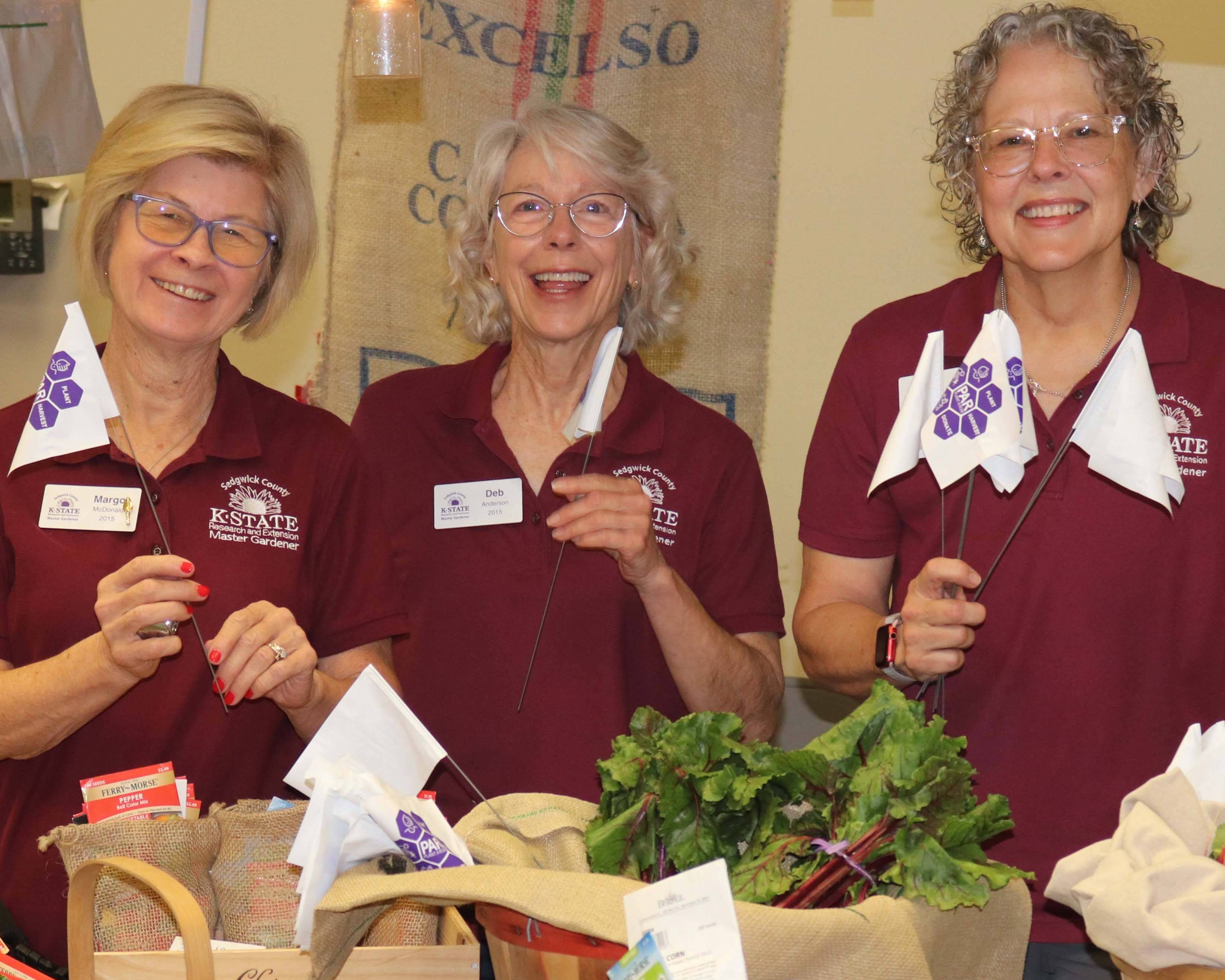 Master Gardener Volunteers manning a community education booth