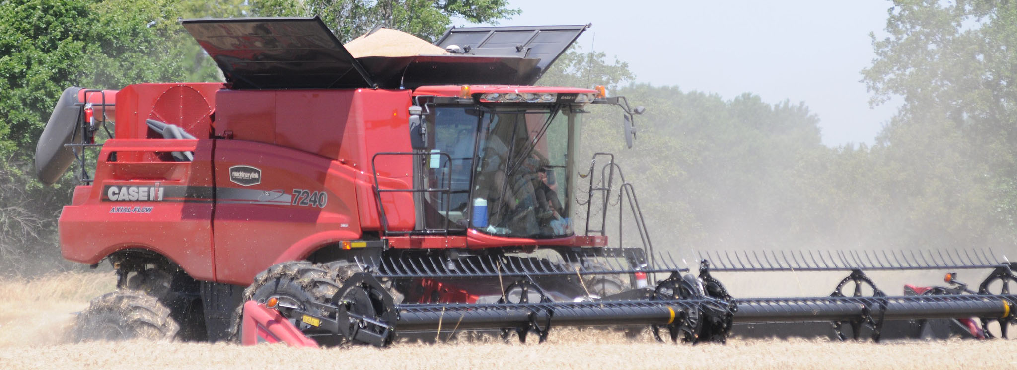 Combine harvesting a wheat field.