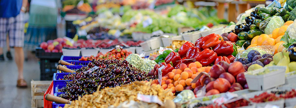 closeup of market fruit and vegetable stand