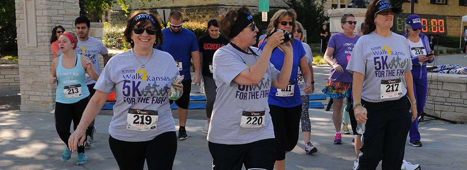 Group of women walking together, beginning of community event