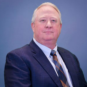 protrait, man wearing blue suit