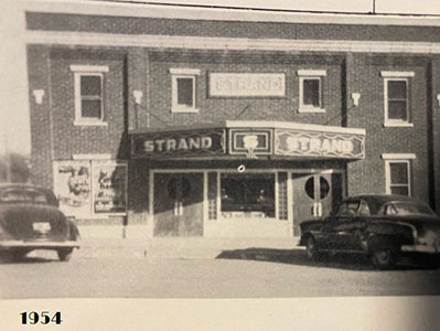 Historical photo of the front entrance to the Strand Theater in Sharon Springs, Kansas