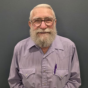 Portrait, Harry Whitney, smiling man with grey beard