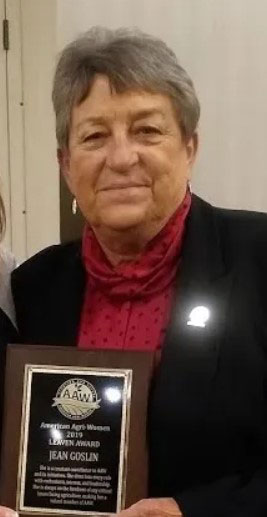 Picture of woman holding plaque