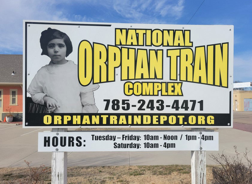 Road sign, National Orphan Train Complex in Concordia