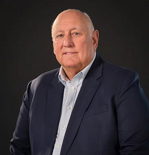 Portrait of man in dark suit